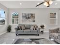 Cozy living room offering abundant natural light and comfortable seating at 4071 45Th N Ave, St Petersburg, FL 33714