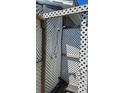 This outdoor shower has lattice walls and metal plumbing at 6903 11Th Ave E, Palmetto, FL 34221