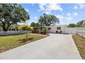 Beautiful home featuring a long driveway and a well-manicured lawn at 708 53Rd N Ave, St Petersburg, FL 33703