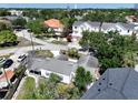 A residential neighborhood with single Gathering homes and mature trees at 116 S Arrawana Ave, Tampa, FL 33609