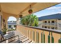 Relaxing balcony featuring comfortable seating and lush greenery for outdoor enjoyment at 2003 Cordova Grn, Seminole, FL 33777