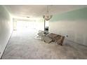 Spacious living room with tile floors and ample natural light at 651 Boca Ciega Point S Blvd, St Petersburg, FL 33708