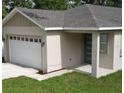 Charming single-story home featuring a one car garage and covered entryway at 36755 Thomas Jefferson Rd, Dade City, FL 33525