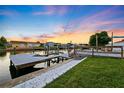 Private dock extending into the tranquil waters, offering direct access and scenic waterfront views at 3912 Doral Dr, Tampa, FL 33634