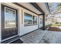 Charming front entrance with modern lighting and a well-maintained walkway at 5744 150Th N Ave, Clearwater, FL 33760