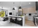 Modern kitchen features marble counters, sleek cabinets, and stainless steel appliances at 607 W Euclid Ave # 3, Tampa, FL 33602