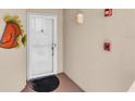 A welcoming entryway with a decorative fish, leading into the condo at 6100 Bahia Del Mar Cir # 105, St Petersburg, FL 33715