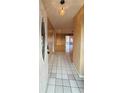 Welcoming entryway showcasing tiled floors and a view into the expansive living spaces at 821 Karen St, Palm Harbor, FL 34684