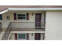 Apartment exterior featuring private porch access and updated details on exterior at 9821 113Th St # 201, Seminole, FL 33772