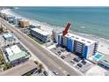 Beautiful condo building with convenient parking and a refreshing swimming pool for residents at 14300 Gulf Blvd # 401, Madeira Beach, FL 33708
