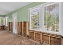 Living room with exposed walls and flooring ready for renovation and personalization at 3031 56Th S St, Gulfport, FL 33707