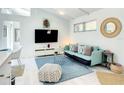 Bright living room featuring contemporary furnishings and a modern aesthetic at 5111 28Th N Ave, St Petersburg, FL 33710