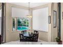 Cozy breakfast nook with views of the pool and backyard at 7533 Dunbridge Dr, Odessa, FL 33556