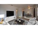 Bright living area featuring modern decor, stylish furniture, and a dining area at 7529 35Th N Ave, St Petersburg, FL 33710