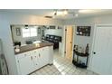 Bright, updated kitchen open to living area, perfect for entertaining guests at 300 6Th N St # E3, Safety Harbor, FL 34695