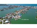 A beautiful island neighborhood provides waterfront living with stunning coastline views from every home at 719 59Th Ave, St Pete Beach, FL 33706