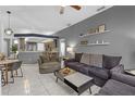 Inviting living room with stylish decor, open layout, and plenty of natural light at 7246 Julian St, New Port Richey, FL 34653