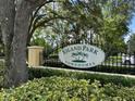 Eiland Park townhome community sign surrounded by mature trees and manicured landscaping at 6250 Maisie Rd, Zephyrhills, FL 33542