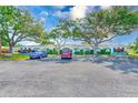Charming exterior featuring well maintained landscaping, covered entrances, and dedicated parking at 11200 102Nd Ave # 75, Seminole, FL 33778