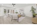 Cozy living room showcasing French doors, neutral decor, and stylish furniture arrangement at 13934 Clubhouse Cir # 8, Tampa, FL 33618