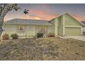 Charming single Gathering home with a well-manicured lawn and attached two car garage at 2816 Manor Hill Dr, Brandon, FL 33511