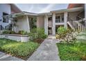 The property exterior has sidewalks and a beautiful garden at 300 S Florida Ave # 200J, Tarpon Springs, FL 34689