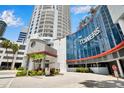Modern condo building exterior with sleek architecture, lush landscaping, and convenient entryway at 449 S 12Th St # 2205, Tampa, FL 33602