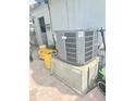The property's air conditioner unit is installed on brick supports at 135 143Rd E Ave, Madeira Beach, FL 33708