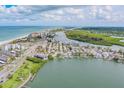 Beautiful aerial view of the coastline, beach, and the waterway where the property is located at 18198 3Rd E St, Redington Shores, FL 33708