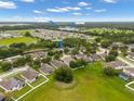 This aerial view shows the neighborhood's proximity to shopping and the Suncoast Parkway entrance for ease of commuting at 396 Winthrop Dr, Spring Hill, FL 34609