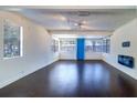 Spacious living room with large windows and dark wood floors at 520 4Th Nw St, Largo, FL 33770