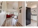 Open living room with hardwood floors and plenty of room for entertaining at 8913 Welsh Way, Hudson, FL 34667
