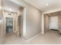 Bright foyer features neutral paint, tile floors and easy access to other rooms in the home at 12436 Shining Willow St, Riverview, FL 33579