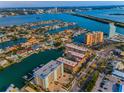 Panoramic aerial view of waterfront condos with beautiful community and water access at 125 Island Way # 502, Clearwater Beach, FL 33767
