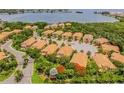 Aerial view of residential community, showcasing well maintained lawns and landscaping at 184 Banyan Bay Dr, St Petersburg, FL 33705