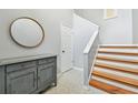 Inviting entryway with decorative floors, stairs and decorative mirror at 3205 W De Leon St # F, Tampa, FL 33609