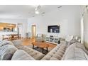 Spacious living room with hardwood floors and comfortable seating at 3205 W De Leon St # F, Tampa, FL 33609