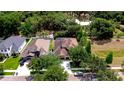 This aerial view showcases a beautiful neighborhood with mature trees and well-maintained homes at 3323 Anna George Dr, Valrico, FL 33596