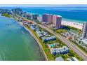 Beautiful aerial view showcasing beach front condos with stunning Gulf views and waterfront access at 1351 Gulf Blvd # 209, Clearwater Beach, FL 33767