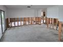 Open-concept interior with exposed framing, ready for customization and modern upgrades at 5688 Oakhurst Dr, Seminole, FL 33772