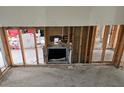 Interior room with exposed framing and plumbing, ready for renovation and design at 5688 Oakhurst Dr, Seminole, FL 33772