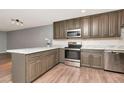 Modern kitchen featuring stainless steel appliances and stylish cabinets at 1200 Tarpon Woods Blvd # M8, Palm Harbor, FL 34685