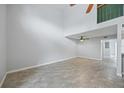 Expansive living room featuring tile flooring, and natural lighting at 1815 Cypress Trace Dr, Safety Harbor, FL 34695