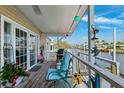 Relaxing outdoor patio featuring comfortable seating, tropical decor, and scenic waterfront views at 18675 Us Highway 19 N # 261, Clearwater, FL 33764
