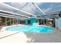 This screened-in pool is perfect for entertaining in the backyard at 4643 Bay Crest Dr, Tampa, FL 33615