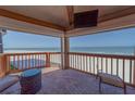 Inviting balcony featuring comfortable seating and ocean views at 17606 Lee Ave, Redington Shores, FL 33708
