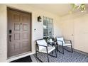 Cozy porch with seating area and stylish decor at 2969 Bonaventure Cir # 104, Palm Harbor, FL 34684