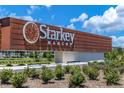 Entrance to Starkey Ranch, a Primary-planned community offering a desirable lifestyle at 3757 Villamore Ln, Odessa, FL 33556
