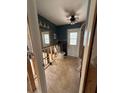 Bathroom undergoing renovations with existing fixtures, a door to outside, and tiled floor at 5201 Denver Ne St, St Petersburg, FL 33703