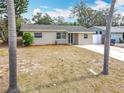 Lovely single-story home featuring a well-maintained exterior with a clean and inviting facade at 6269 50Th N Ave, St Petersburg, FL 33709